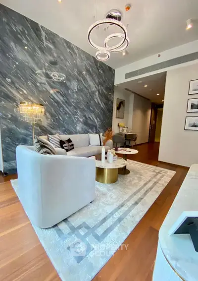 Luxurious living room with modern decor and elegant lighting in upscale apartment