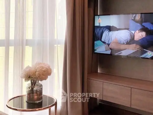 Cozy living room with modern TV setup and elegant decor