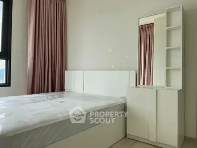 Modern bedroom with stylish white furniture and large window with pink curtains.