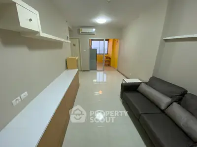 Spacious living room with modern sofa and sleek storage solutions