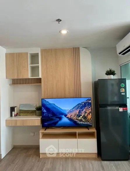 Modern living room with sleek TV unit and stylish decor