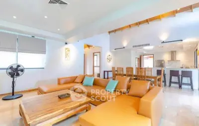 Spacious modern living room with open kitchen and stylish furniture