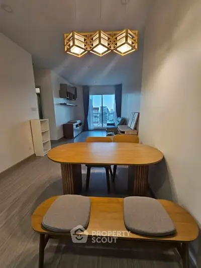 Modern living room with stylish wooden furniture and ambient lighting