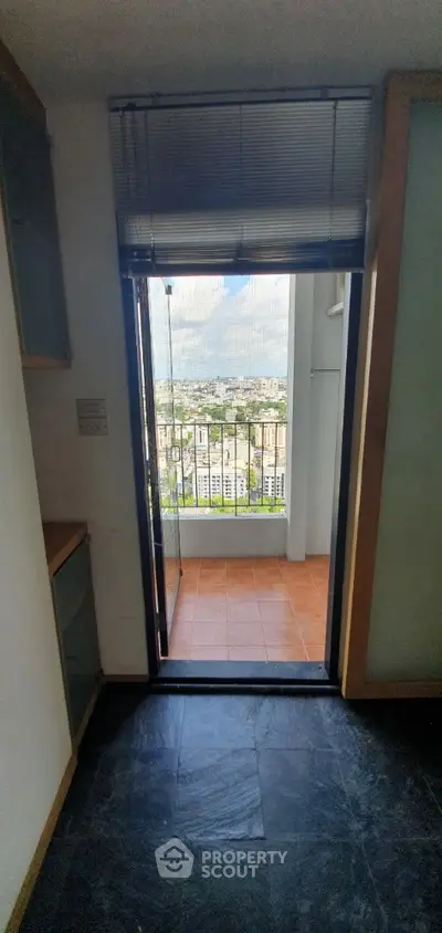 Stunning high-rise apartment with balcony offering breathtaking city views