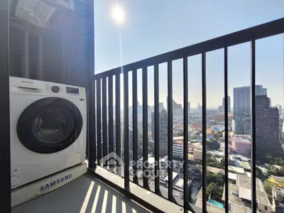 High-rise balcony with city view and washing machine, perfect for urban living.