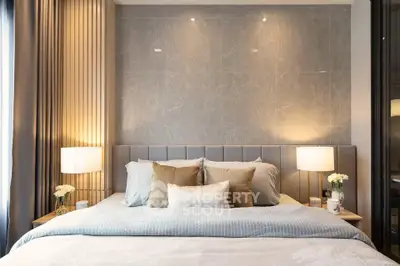 Luxurious bedroom with elegant lighting and plush bedding