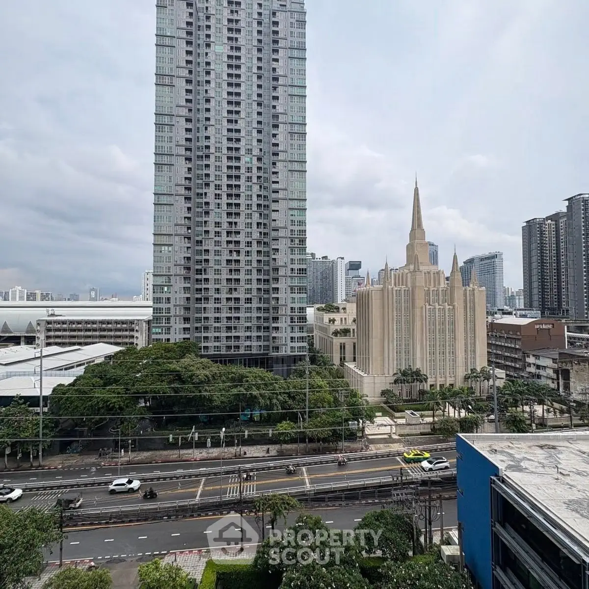 Stunning cityscape view with modern high-rise buildings and bustling streets.