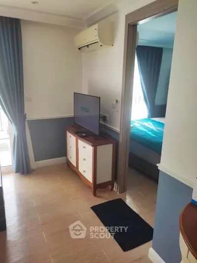 Charming apartment interior with cozy bedroom and stylish decor, perfect for modern living.