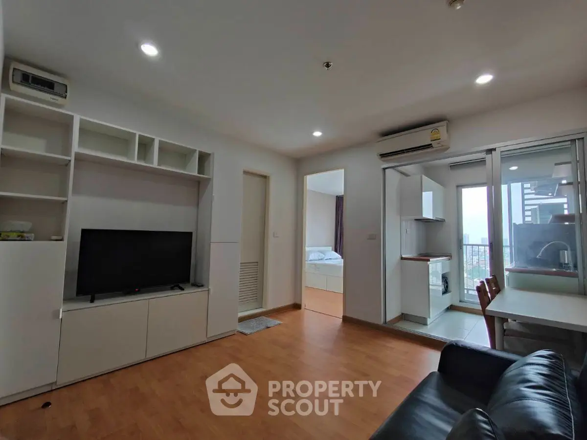 Modern apartment living room with open layout and city view