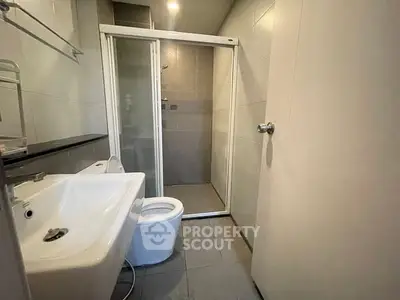 Modern bathroom with sleek shower and contemporary fixtures
