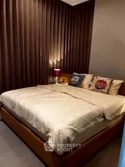Luxurious bedroom with elegant decor and cozy lighting for a perfect retreat.
