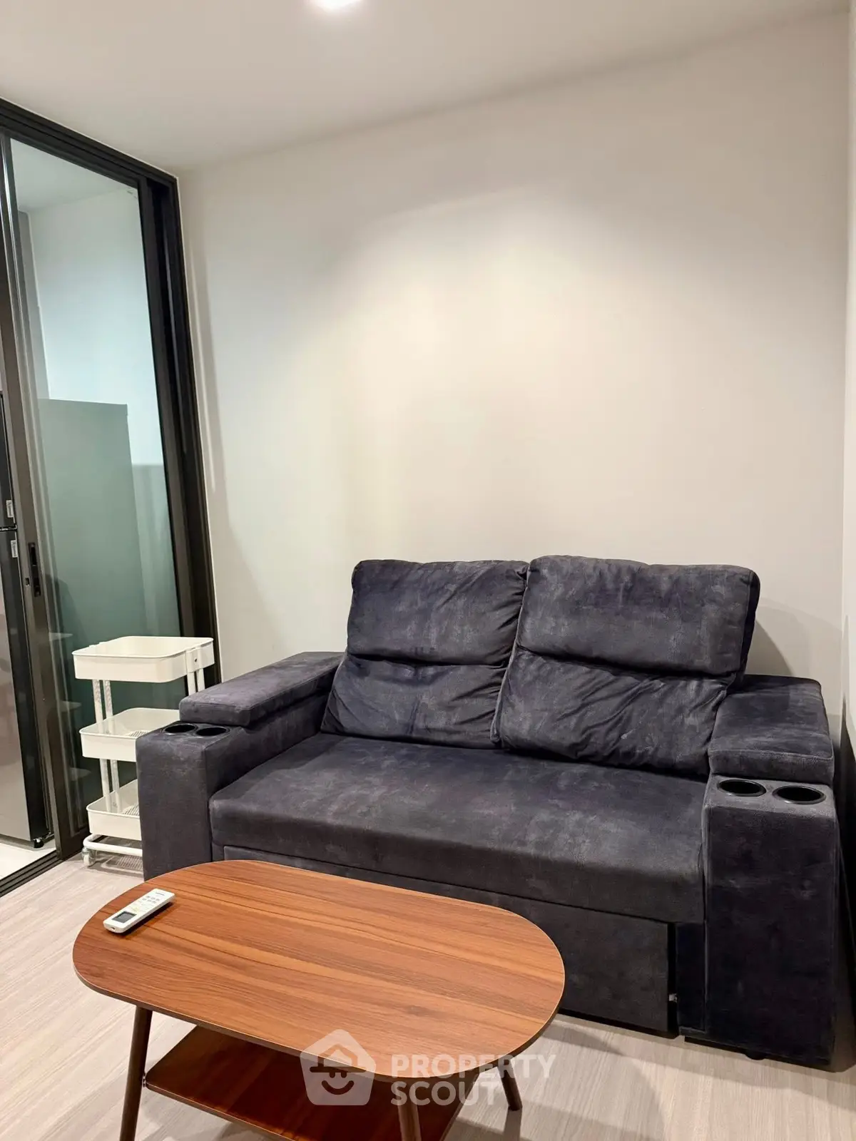 Cozy living room with modern sofa and sleek wooden coffee table