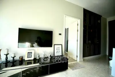 Modern living room with sleek TV setup and stylish decor