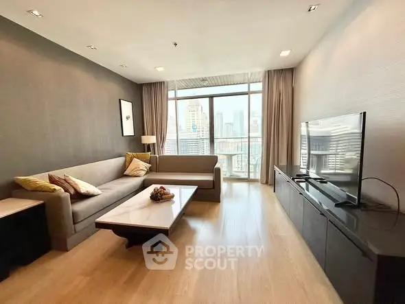 Spacious modern living room with city view and elegant decor