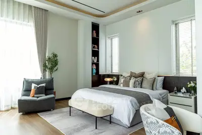 Luxurious modern bedroom with elegant decor and natural light