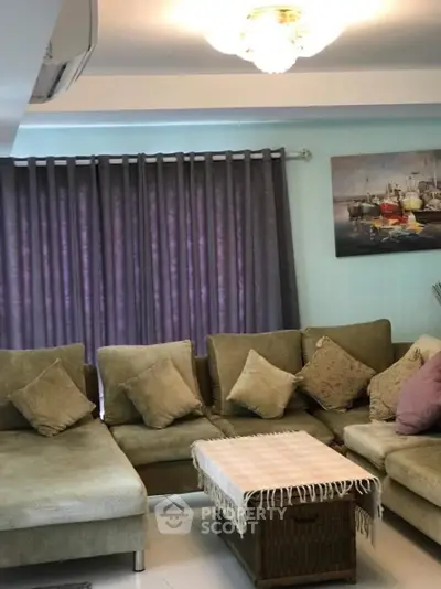 Cozy living room with plush sectional sofa and elegant decor