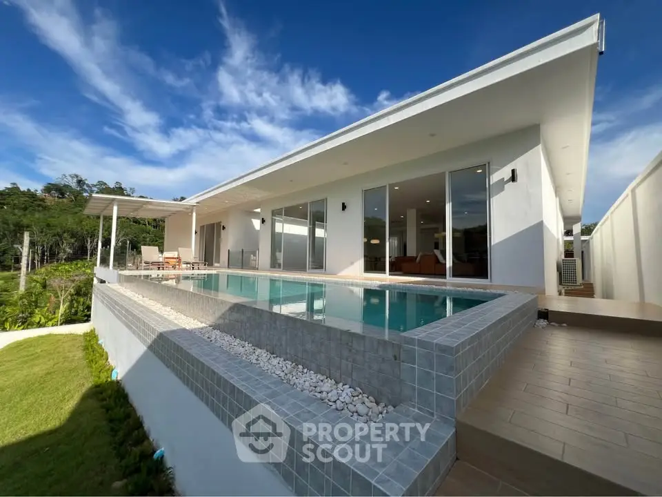 Luxurious modern villa with stunning pool and scenic views