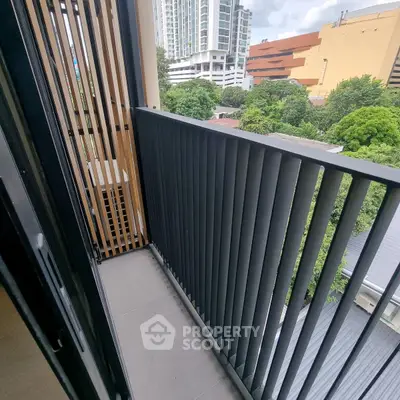 Modern balcony with sleek railing and city view