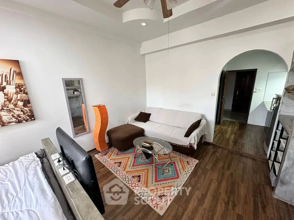 Cozy living room with modern decor and wooden flooring