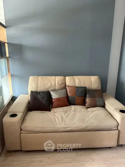 Cozy living room with stylish sofa and modern decor