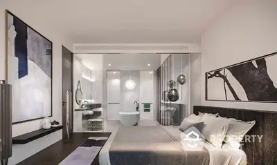 Luxurious bedroom seamlessly integrates with an open-concept ensuite bathroom, featuring modern fixtures and elegant decor for a sophisticated living experience.