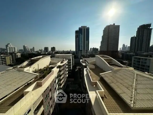 Stunning cityscape view from a high-rise building showcasing modern architecture and skyline.
