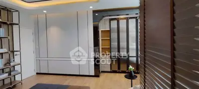 Modern living room with sleek design and stylish shelving unit