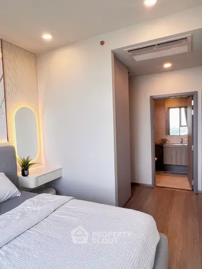 Modern bedroom with ensuite bathroom and stylish decor