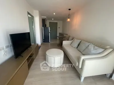 Modern living room with stylish furniture and open layout in a contemporary apartment.