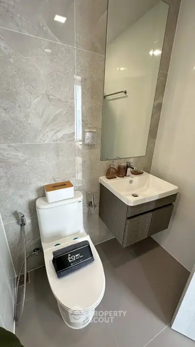 Modern bathroom with sleek fixtures and elegant tile design