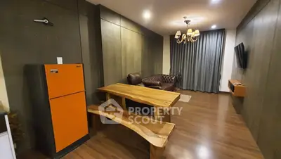 Stylish living room with wooden furniture and modern lighting