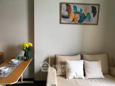 Cozy living room with modern decor and elegant wall art
