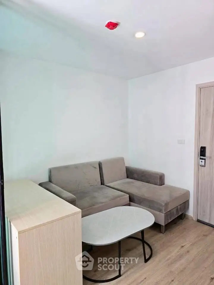 Modern living room with cozy sectional sofa and sleek coffee table