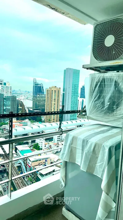 Stunning high-rise balcony view with cityscape and modern architecture.