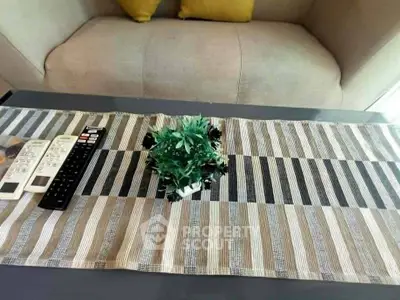 Stylish living room with modern decor and cozy seating area.