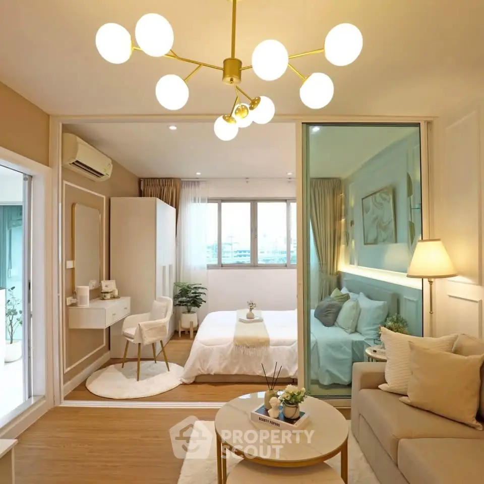 Luxurious modern bedroom with elegant decor and spacious layout, featuring a cozy seating area and stylish lighting.