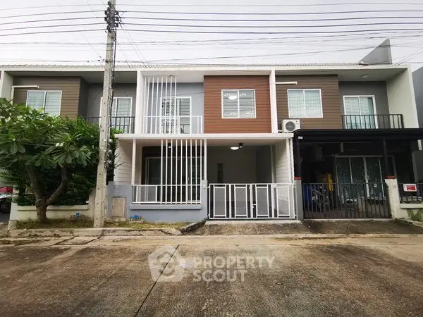 Modern townhouse exterior with clean lines and contemporary design