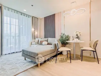 Modern living room with stylish decor and large windows offering city views.