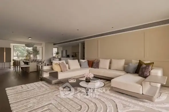 Spacious modern living room with elegant decor and large sectional sofa