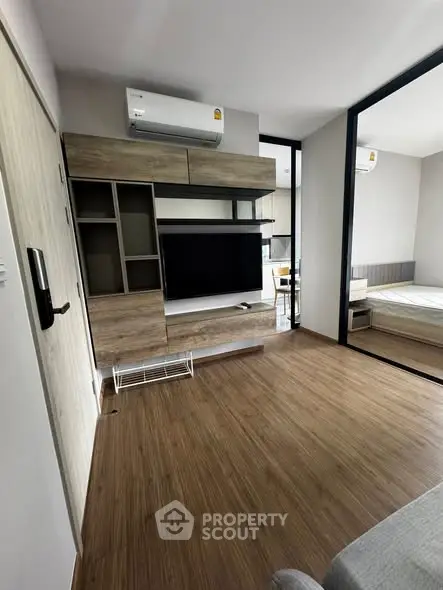 Modern apartment interior with wooden flooring and stylish furniture