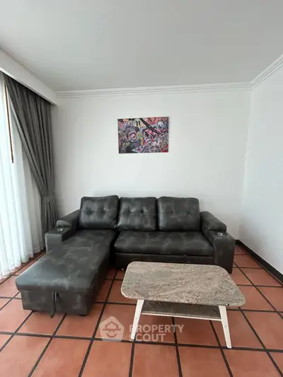 Stylish living room with modern sofa and artistic wall decor