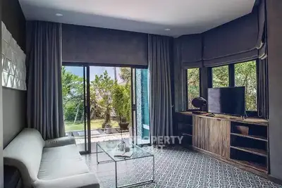 Luxurious living room with modern decor and garden view