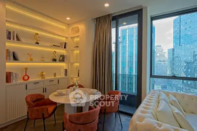 Modern living room with city view, elegant furniture, and ambient lighting.