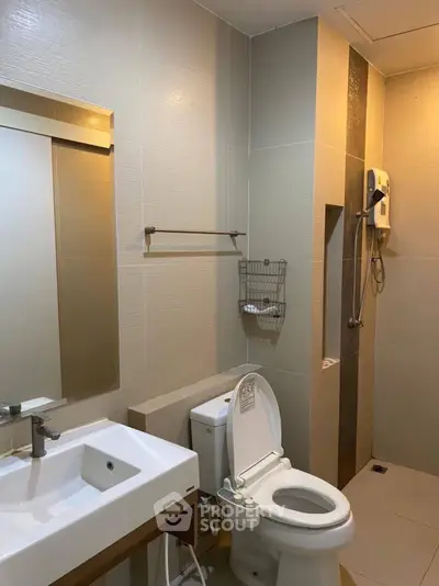 Modern bathroom with sleek fixtures and neutral tones