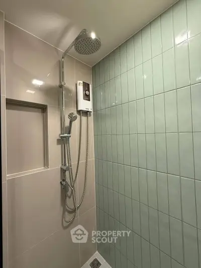 Modern bathroom shower with sleek design and tiled walls