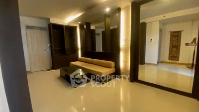 Modern living room with sleek furniture and ambient lighting