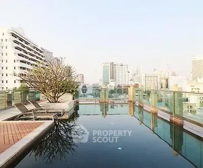 Stunning rooftop pool with city skyline views, perfect for luxury urban living.