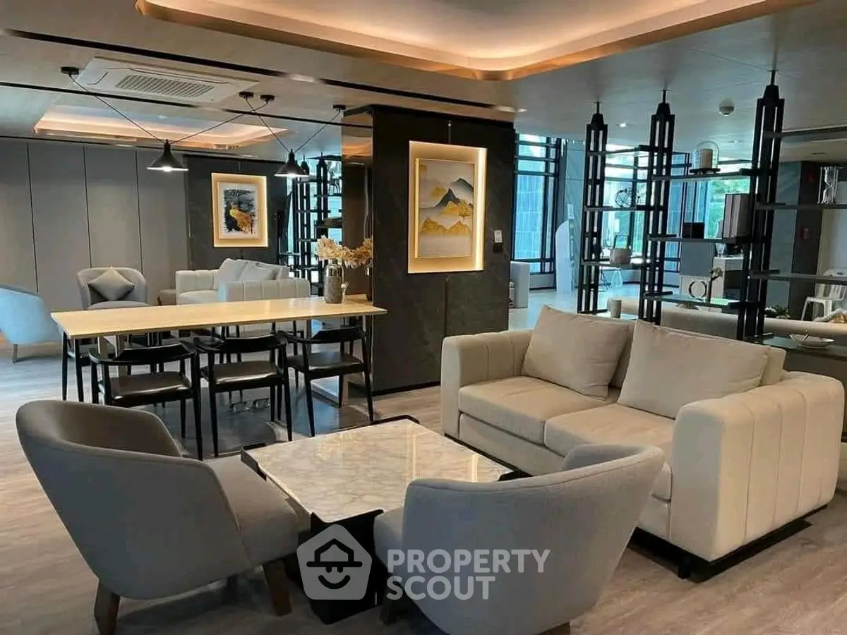Luxurious modern living room with elegant furniture and stylish decor, perfect for sophisticated urban living.