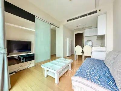 Modern living room with stylish decor and open kitchen layout