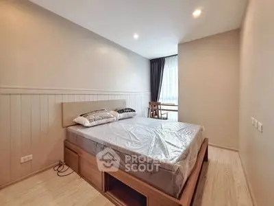Modern bedroom with natural light and stylish wooden furniture